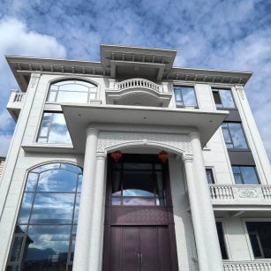 双鸭山白麻别墅外墙干挂石材效果示例