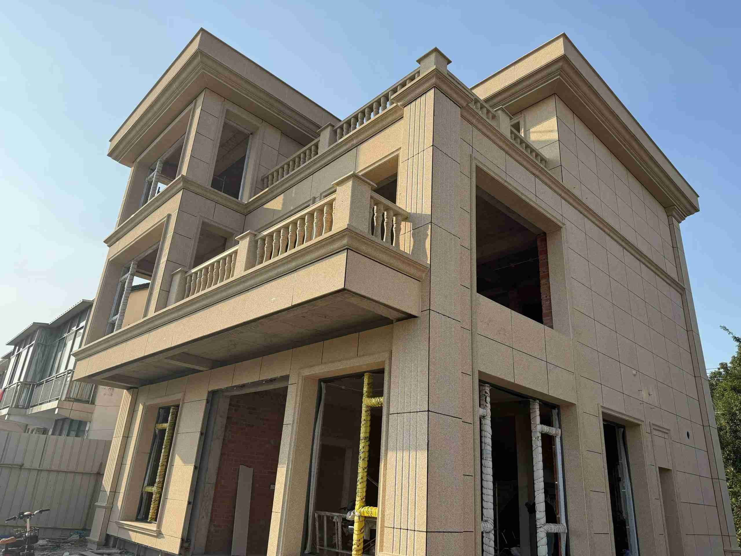 双鸭山 黄金麻花岗岩石材荔枝面外墙干挂效果展示